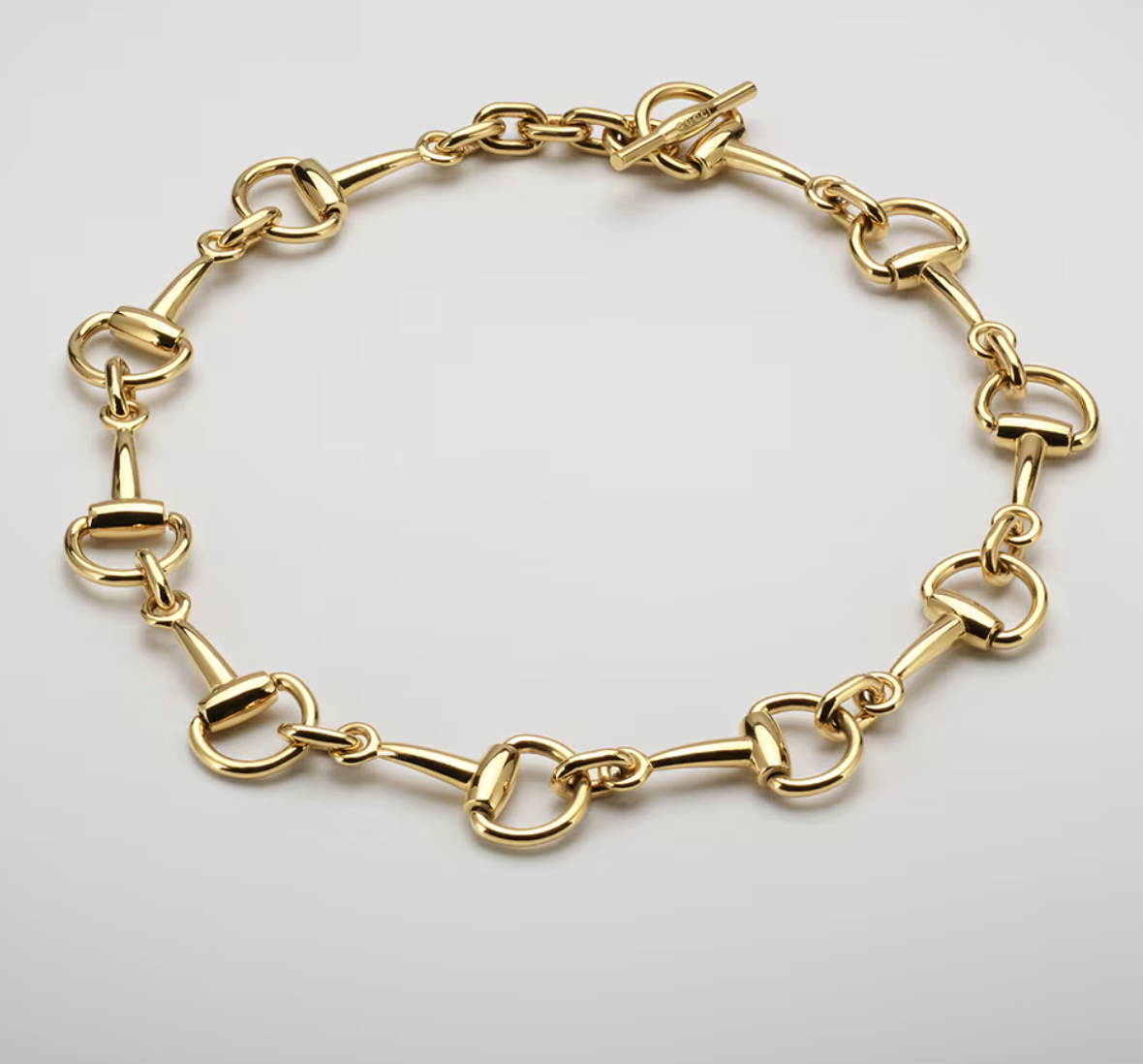 Gold horsebit chain necklace with toggle clasp